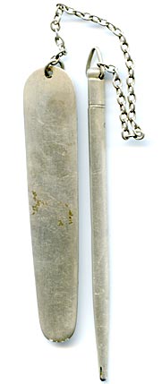 This bookmark was made in the US by Daniel Low and Co. It is comprised of a flat blade connected by chain to a mechanical pencil. It is marked sterling on the top of the pencil and engraved Salem on the blade. The blade also shows the famous Salem witch riding a broom, the trademark of Daniel Low.