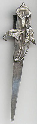 This is an art nouveau bookmark made sometime between 1904 and 1914. The manufacturer is F.S. Gilbert, a small maker of silverware in North Attleboro, Massachusetts. The bookmark is marked Sterling G.