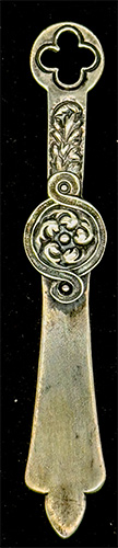 This bookmark was made in the US by Gorham Mfg. Company. It is marked with the manufacturers mark, sterling 36 and a star (indicating 1871). 36 is the number from the Autumn 1888 catalogue.