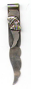 This bookmark was made in the US by Towle Silversmiths. It is marker with the makers hallmark and Sterling 12. The top blade has a Roman head medalion. The date is 1900 - 1910.