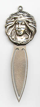 This bookmark was made in the US by W.H. Saart Co. It is marked Sterling Front and the manufacturers hallmark. The top is an art nouveau lady head and the date is 1900 - 1910.