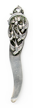 This bookmark was made in the US by an unknown manufacturer. It is marked only sterling. The top blade is an intricate relief depiction of a flock of birds. The date is 1900 - 1910.