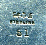 This bookmark was made in the US by Gorham Mfg. Company. It is marked with the manufacturers mark, sterling and 51, the number from the Autumn 1888 catalogue. The top blade is the head of the Roman god Mercury. 