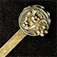 This bookmark was made in the US by Unger Bros. It is marked with the makers hallmark and Sterling 925 Fine. It an art nouveau flower design. This bookmark was sold from the 1904 Unger Bros. catalog.