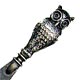 This bookmark was made in England. It is marked C&N Silver. The top is a three dimensional figural owl. The date is unknown.
