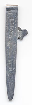 his bookmark was made in the US by Gorham. It is marked with Gorham, the makers hallmark, and Sterling. It is a figural of a Highwayman with a mask and a gun. The front says, "He robs us of nothing but care.". The back says, "Souvenir of the 150th Performance. The Highwayman. March 21st, 1898. Broadway Theatre Opera Company. Andrew McCormick, Manager."