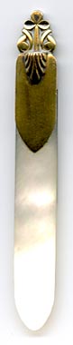 This bookmark was made in France by Jules Herice. It is marked on the top blade and on the back of the top blade with the initials JH.  The top blade looks to be either gold or brass. The bottom blade is mother of pearl. The very top has a clover.