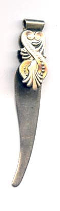 This bookmark was made in the US by Whiting Mfg. Co. It is marked sterling and has the makers mark on the back. It is a "folded" bookmark and the top blade has an art nouveau design.