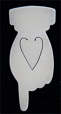 This bookmark was made in Birmingham, England by Chrisford and Norris. it is hallmarked for Birmingham 1905. The bookmark is in the shape of a hand with the index finger pointing down.
