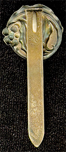 This bookmark was made in the US by Unger Bros. It is marked with the makers hallmark and Sterling 925 Fine. It an art nouveau flower design. This bookmark was sold from the 1904 Unger Bros. catalog.