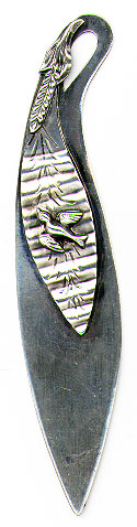 This bookmark was made in the US by an unknown manufacturer. It is marked only sterling. The top blade has a flying bird. The date is 1900 - 1910.