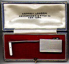 This bookmark was made in England in 1936. It was made by Asprey of London for export to the US for Abercrombie and Fitch Co. It is a page holder type of bookmark where the base is cliped over the cover or back of the book and the arm holds the particular page open. The interesting thing to note about this bookmark is that even though the manufacturer is in London, it has a Birmingham city mark. 