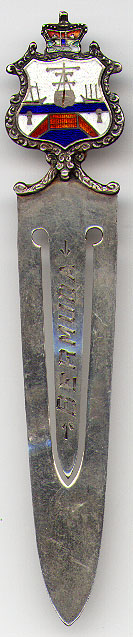 This bookmark was possibly made in Bermuda. It is marked PH Sterling on the back and the front is inscribed "Bermuda". It has an enamel and silver shield on the top. The date is 1910 - 1930. 