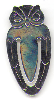 This bookmark was made in the US by Tiffany and Co. It is marked Sterling Tiffany and Co. and is in the shape of an owl. It was probably made between 1970 - 1980.