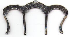This bookmark was made in the US by an unknown manufacturer. It is marked Pat.1.89 and Sterling. It is a unique shape that was used to hold books open. It was also used to hold music open. A similar bookmark was sold in the 1901 catalog of Daniel Low and Co. The date is 1889.