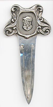 This bookmark was made in the US by Shiebler. It has the manufacturers hallmark and sterling on the back. The top has a medallion of a Roman warrior. The date is 1890 - 1900.  